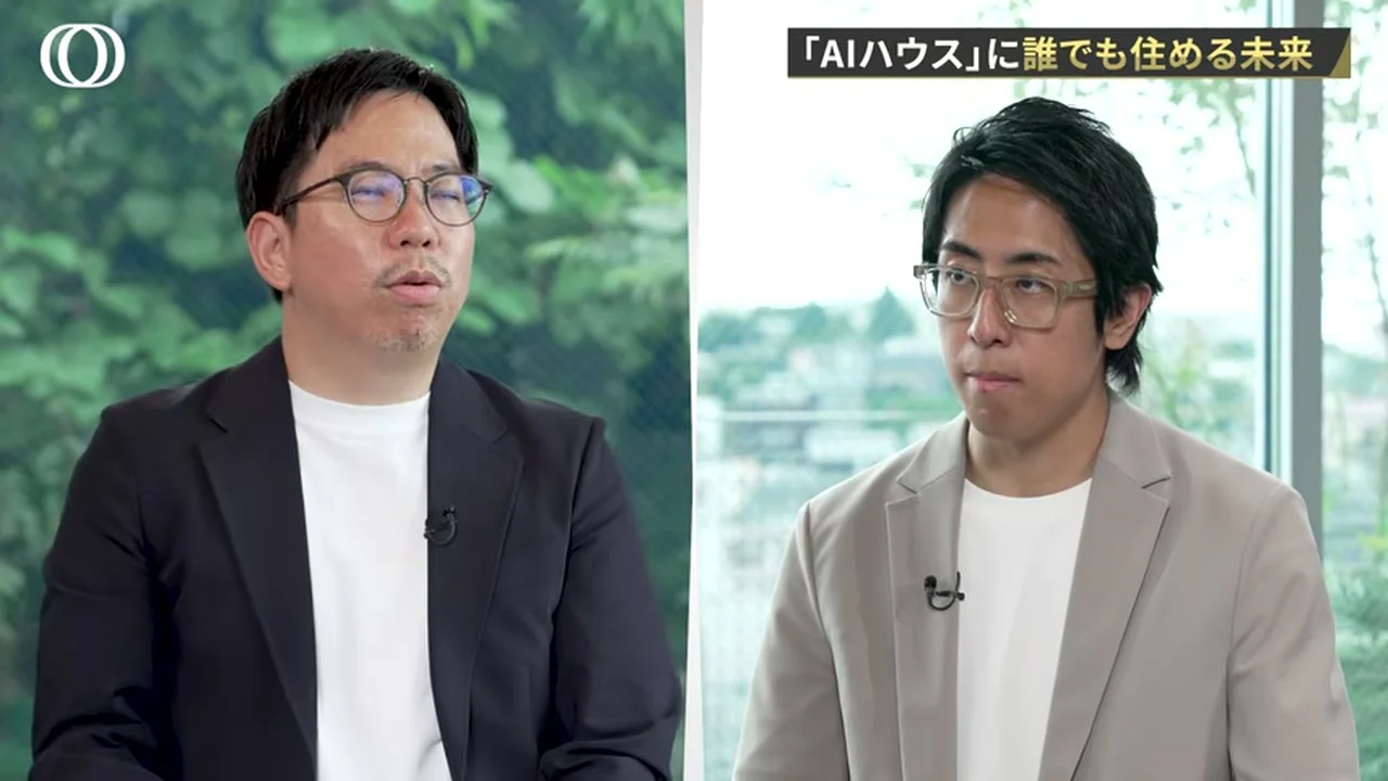 動画の画面。対談の場面で、AIハウスに誰でも住める未来というテロップの下、二人の男性が話している場面