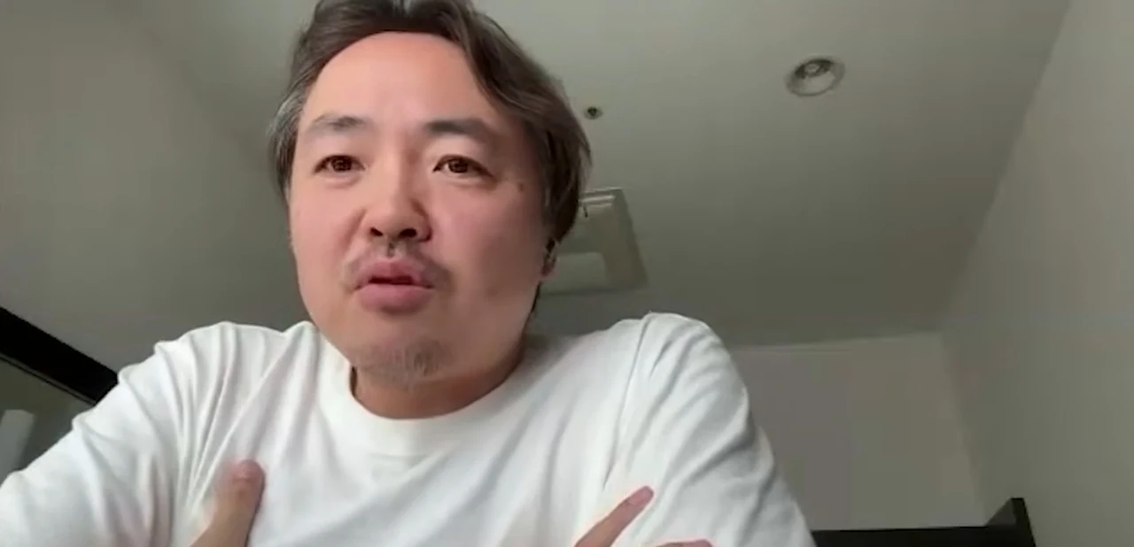 動画の画面。すがけんさんが月80万円と時給の計算を問い返している場面