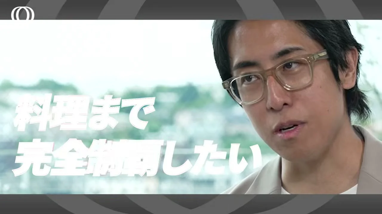 動画の画面。冒頭のハイライトで、男性が話し、料理まで完全制覇したいという字幕が出ている場面