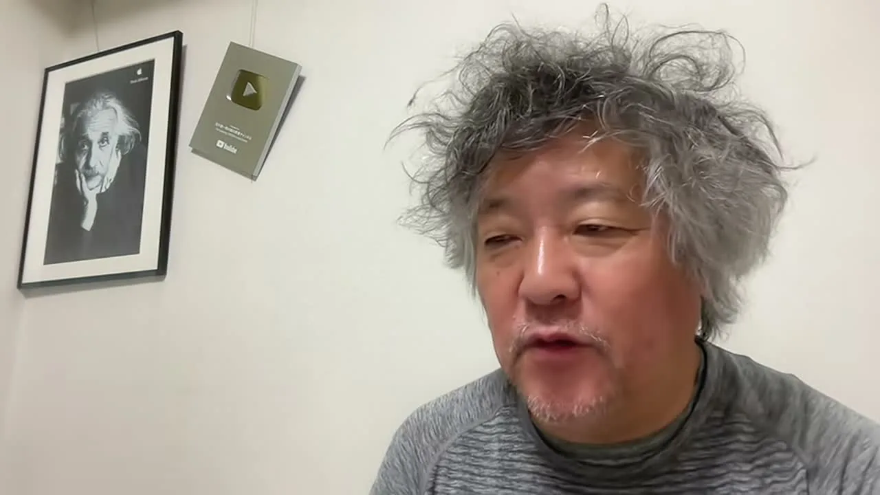 動画キャプチャ: 茂木さんが目を伏せて話す場面（4:59頃）